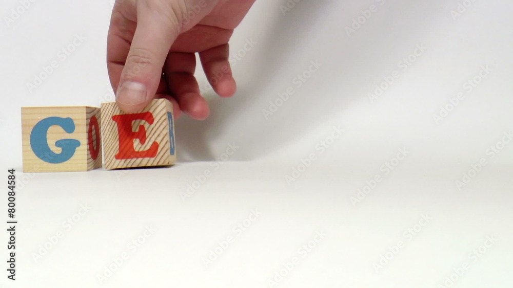 The video shows German word built of wooden blocks
