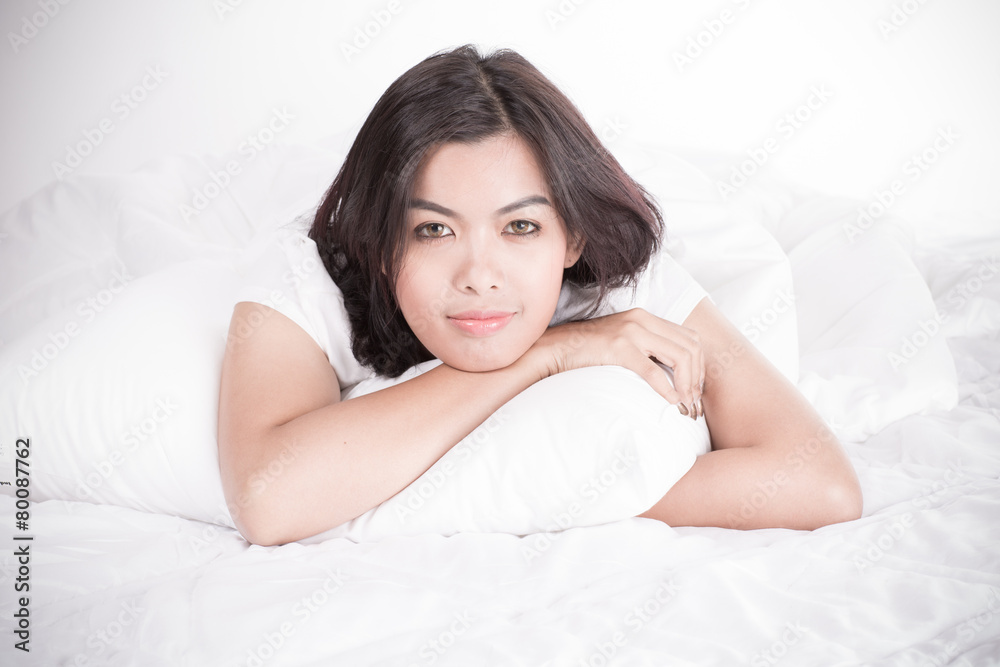 Portrait of a beautiful young woman in bed Portrait of a beautiful young woman in bed