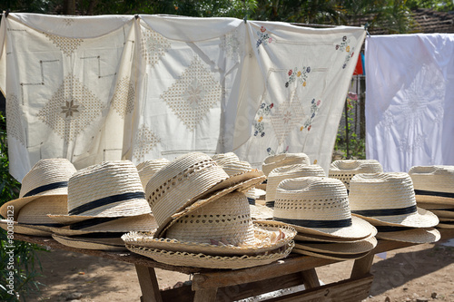 Canvas Print Straw hats on street stall in Trinidad