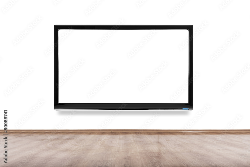 Empty room with HD TV at the wall Empty room with HD TV at the wall