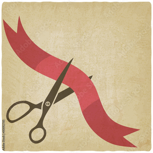 Scissors cut red ribbon