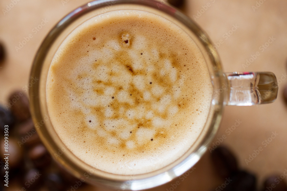 Cup of latte coffee with biscotti Cup of latte coffee with biscotti