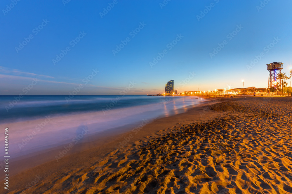 Fototapeta premium The beach of Barcelona in Spain at sunset