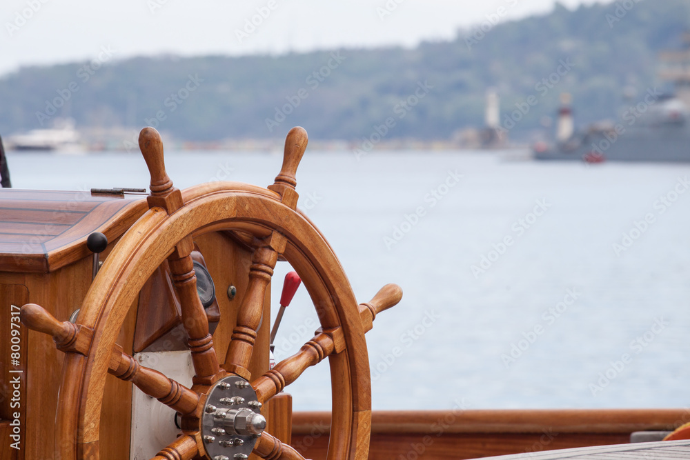 Foto Stock Old boat steering wheel from wood | Adobe Stock