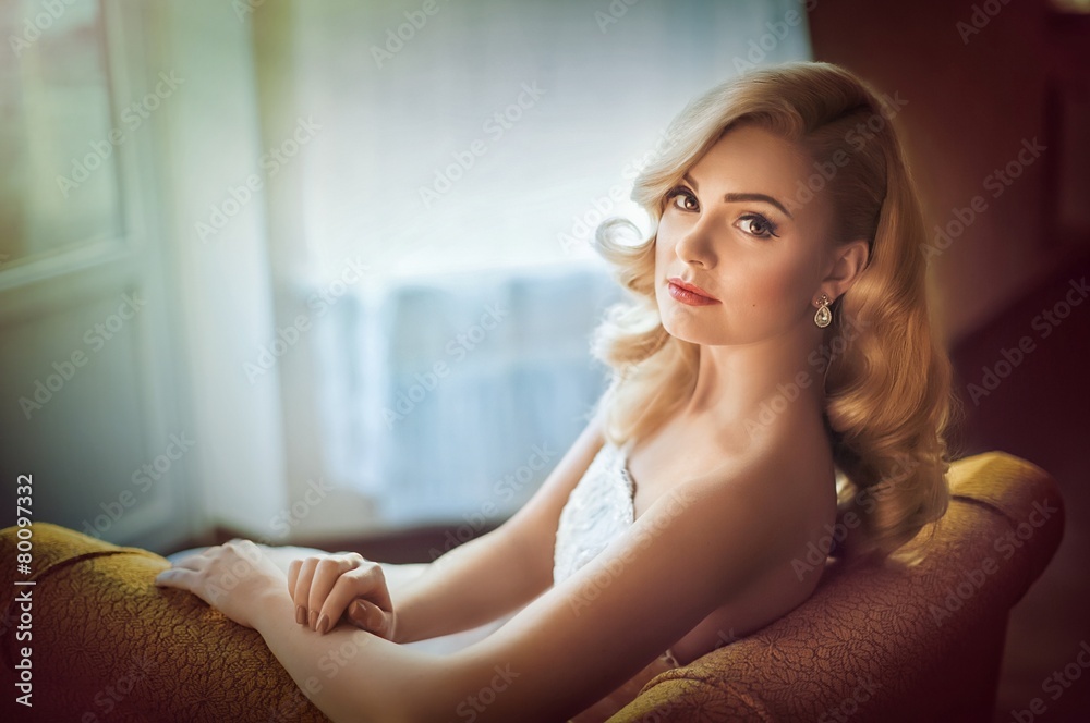 Beautiful bride blonde with stylish make-up in white dress Beautiful bride blonde with stylish make-up in white dress