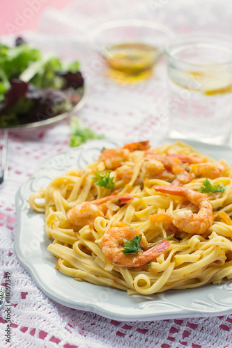 Pasta with shrimps and tomato sauce