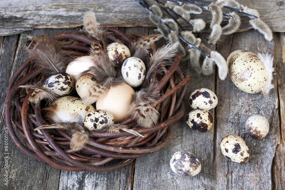 Easter eggs on wooden plank