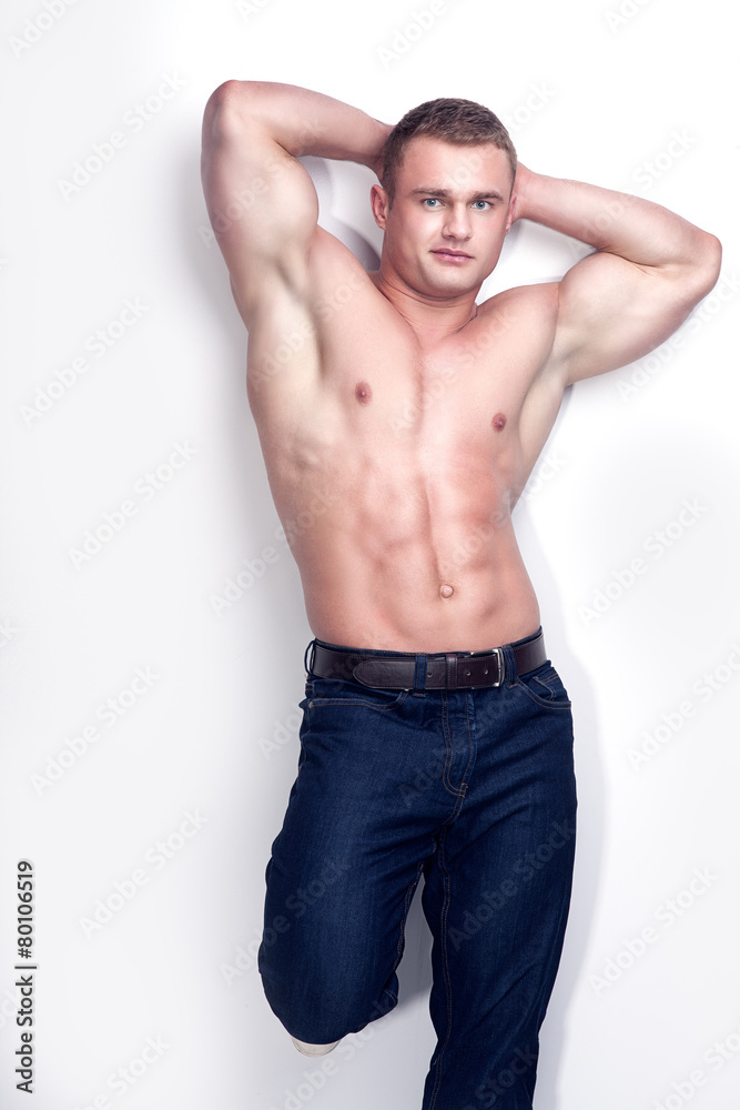 Muscular man posing.