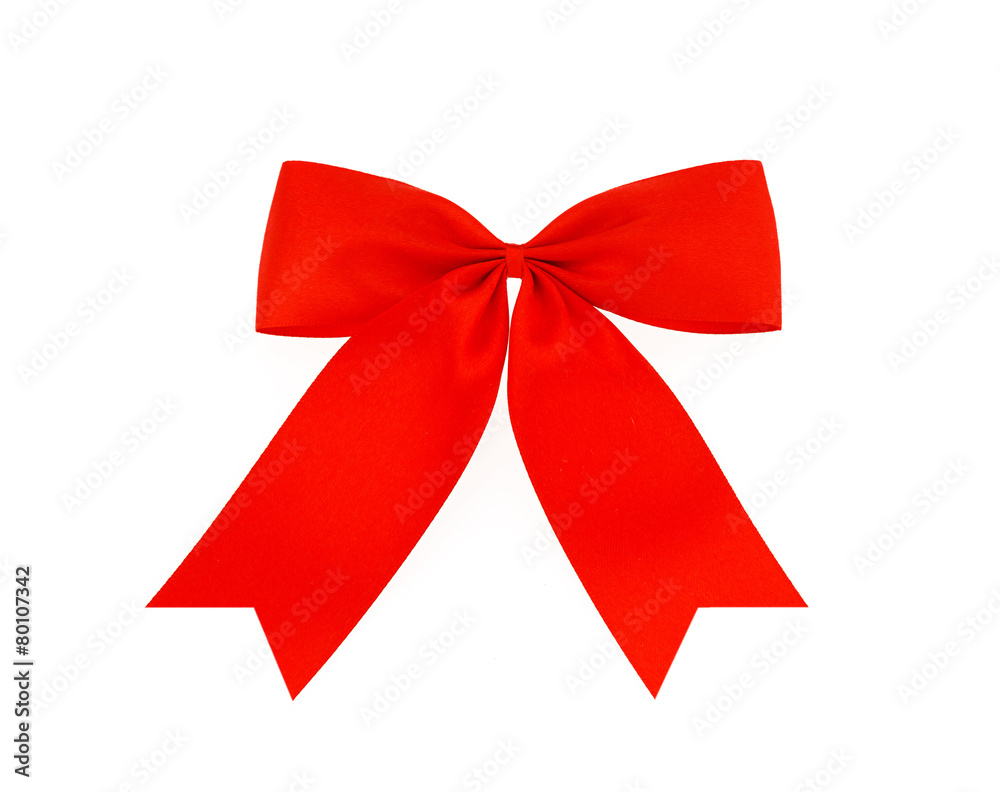 Fototapeta premium Festive red bow made of ribbon isolated on white