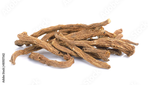 angelica sinensis herb on white background photo