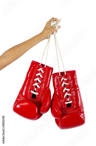 Red boxing gloves on hands isolated on white © piyathep