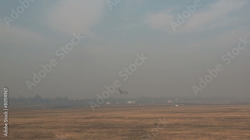 Aeroplane Landing in the mist photo