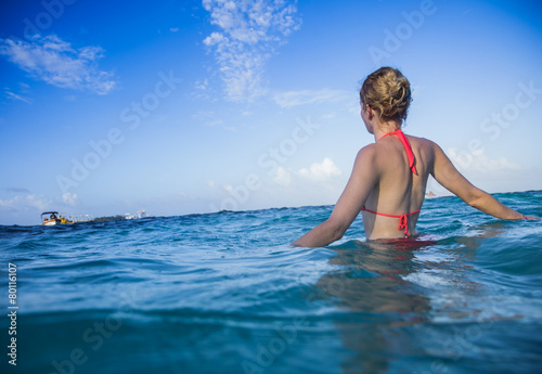 Woman at the Sea Enjoying the hot Water