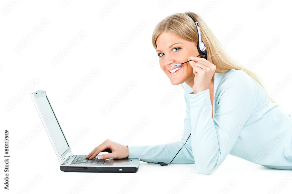 Blonde girl working on laptop and chatting Blonde girl working on laptop and chatting