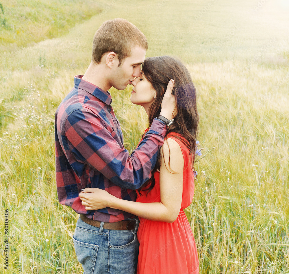 stunning sensual outdoor portrait of young attractive couple in