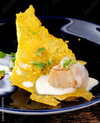 Fototapeta Naklejka Na Ścianę i Meble -  Haute cuisine, Gourmet food scallops on a corn crunch