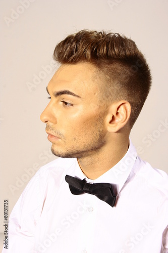 Glamour man portrait with holiday dress and hairdress photo