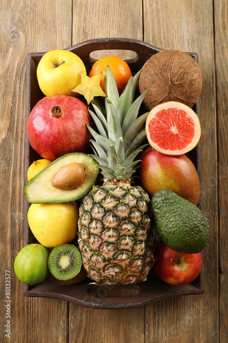 Assortment of fruits on wooden table
