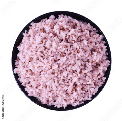 Brown rice in black bowl