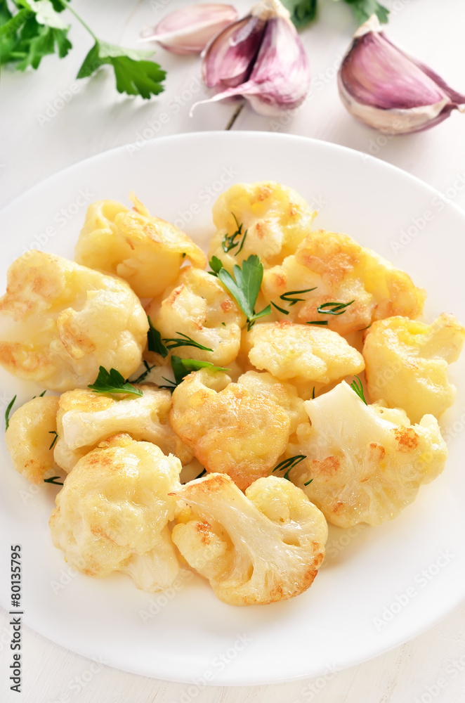 Fried cauliflower on white plate Fried cauliflower on white plate