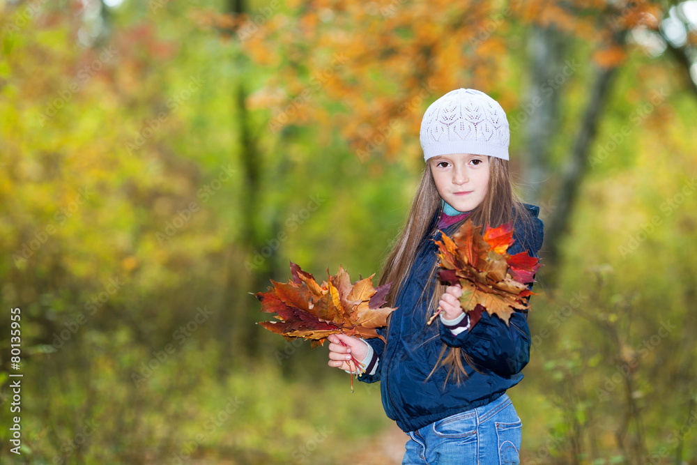 lovely girl  with a bunch of leaves