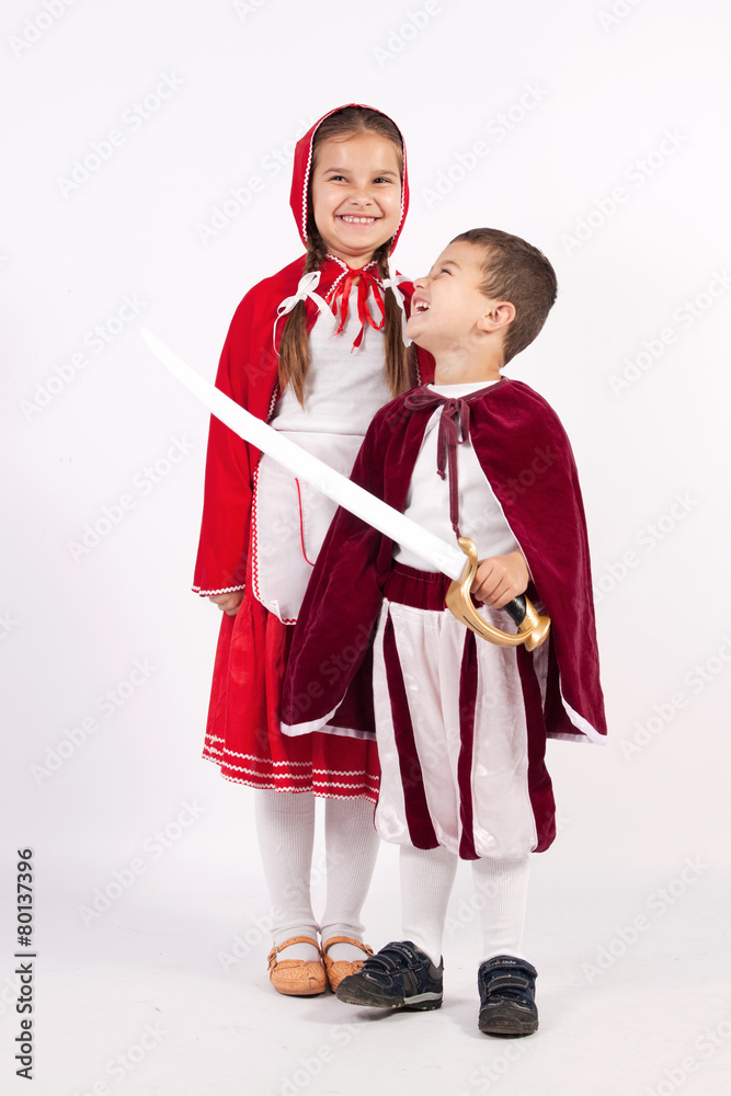 Girl and boy in costumes from fairy tales