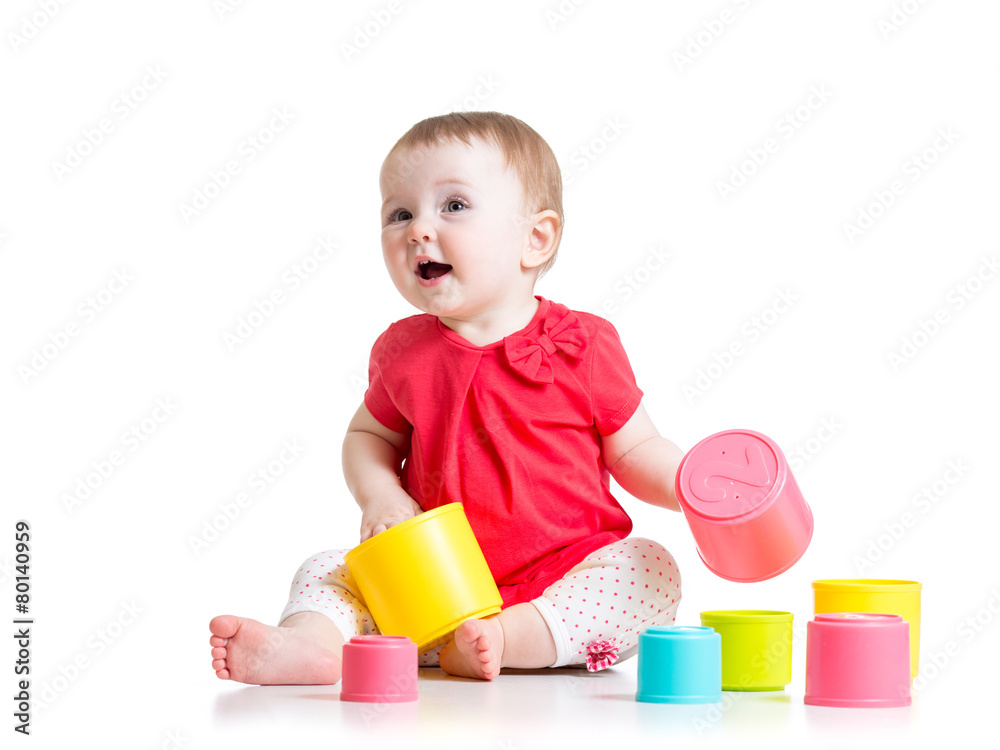 funny baby playing with colourful cup toys, isolated over white funny baby playing with colourful cup toys, isolated over white