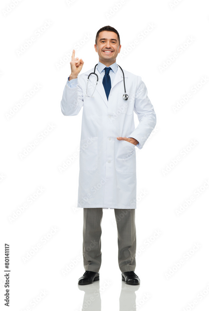 happy male doctor in white coat pointing finger up happy male doctor in white coat pointing finger up