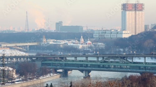 Cityscape of Moscow with Academy of Science, Shuhovskaya tower and traffic on Metrobridge photo