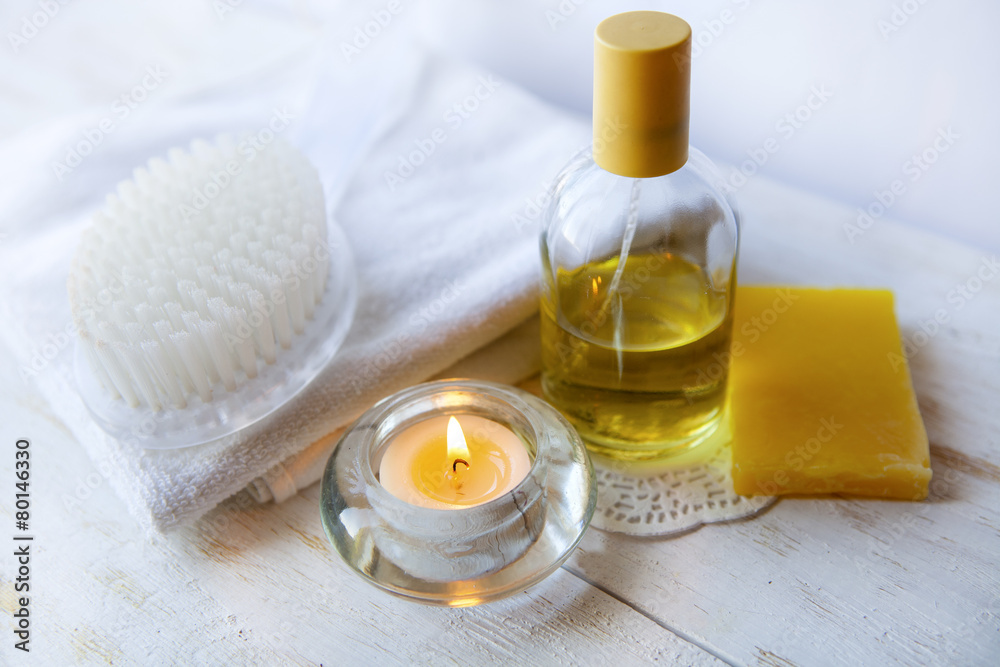 spa accessories and candles on white background spa accessories and candles on white background
