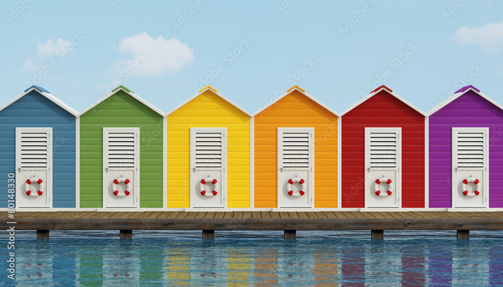 Beach cabins on wooden pier