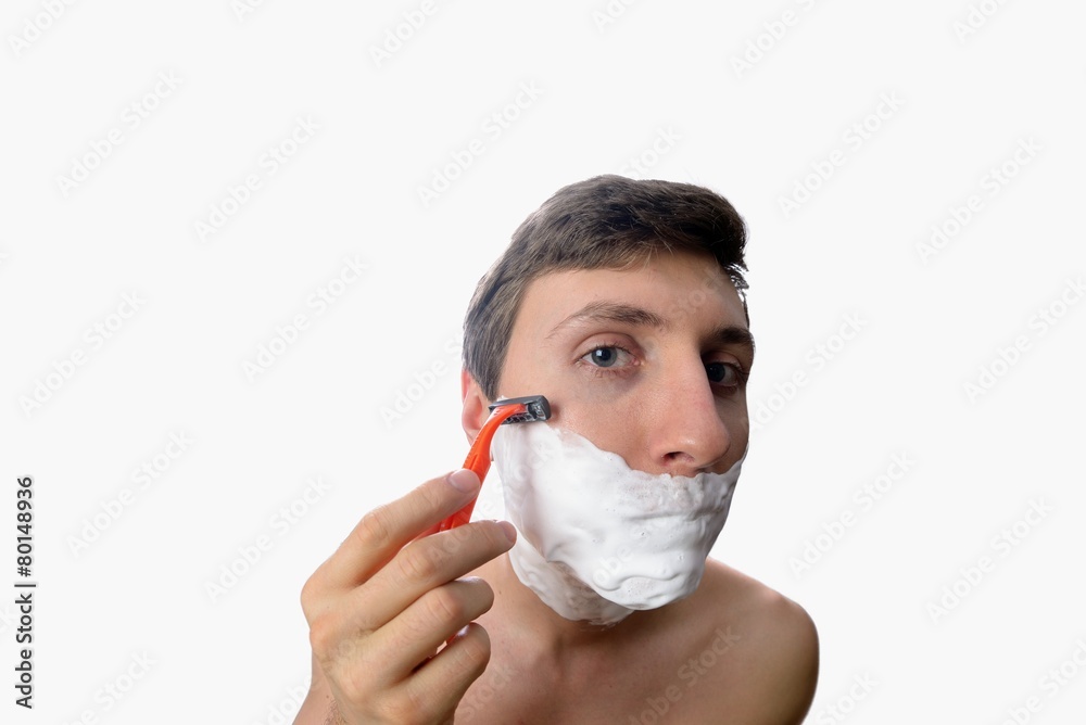 Fun fisheye view of young man who has shave on white background Fun fisheye view of young man who has shave on white background