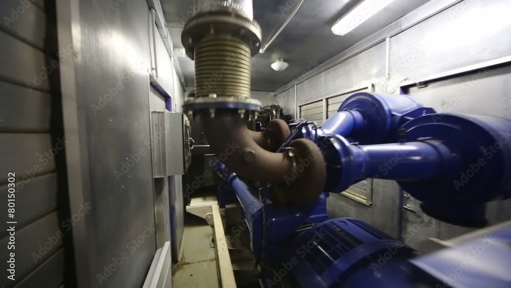 Diesel generator for backup power in room with control panel