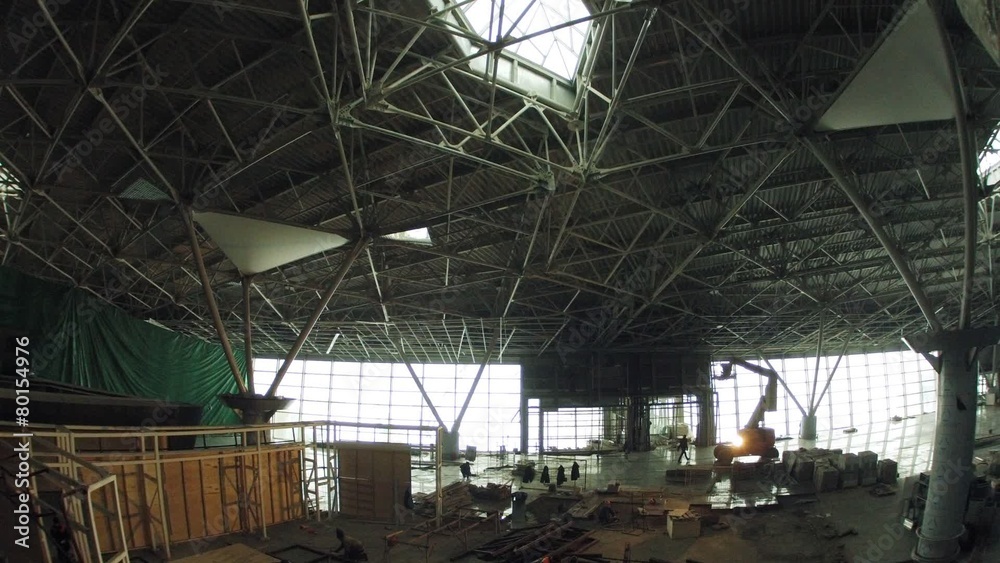 Inside of airport terminal construction, wide view. Timelapse Inside of airport terminal construction, wide view. Timelapse