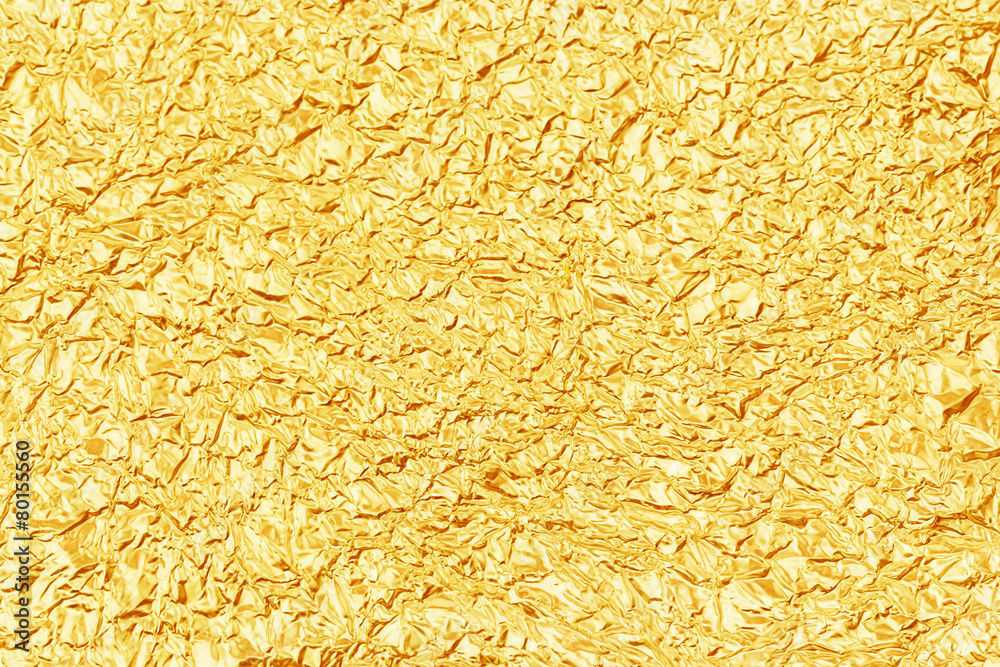 Shiny yellow leaf gold foil texture for background