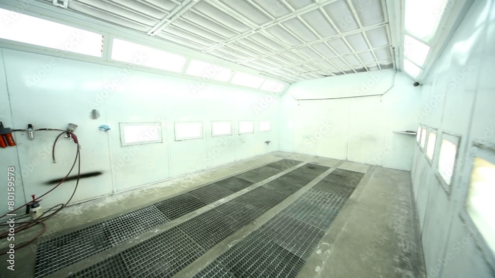 Entrance to paint-spraying booth with many lights for cars Entrance to paint-spraying booth with many lights for cars