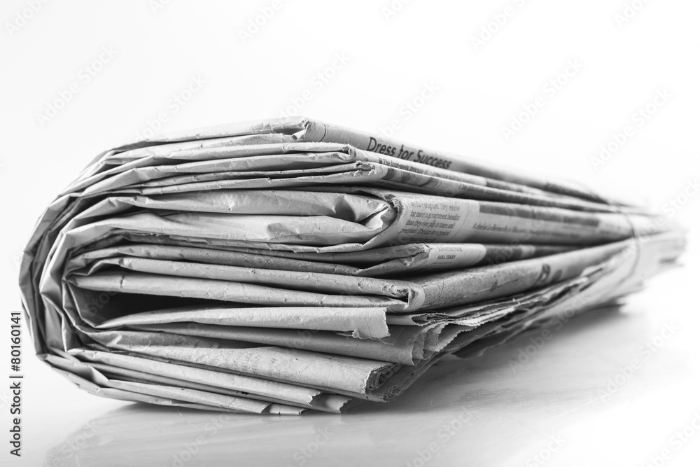 Articles. newspaper with news closeup on white background Articles. newspaper with news closeup on white background