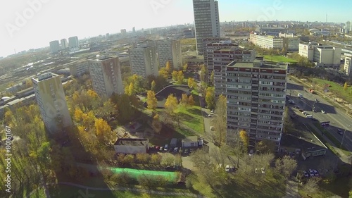 Cityscape with traffic on highway and residential houses photo