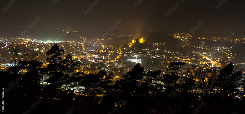 marburg germany at night as an panoramic view - obrazy, fototapety, plakaty 