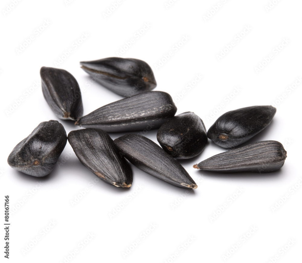 Sunflower seeds isolated on white background close up Sunflower seeds isolated on white background close up