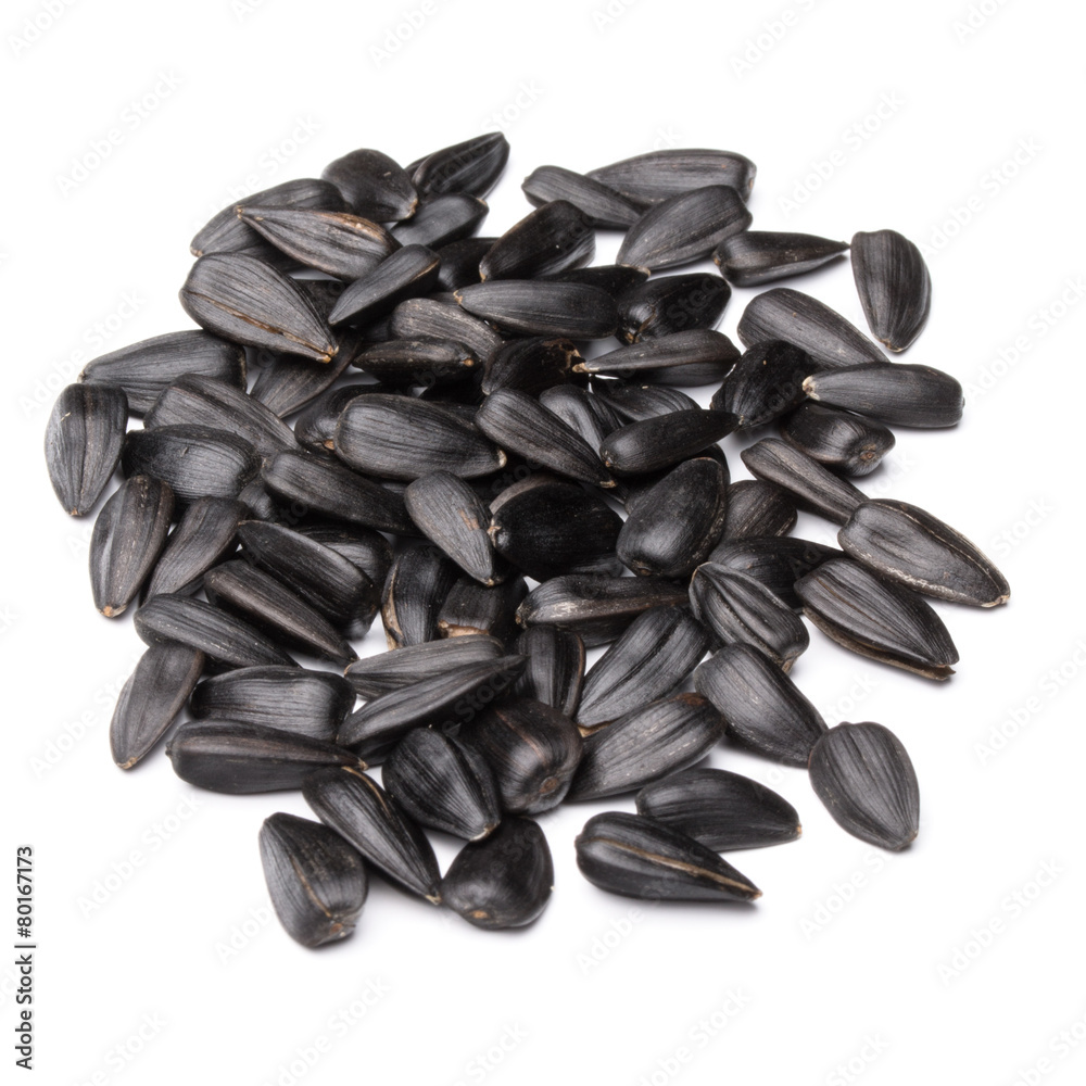 Sunflower seeds isolated on white background close up Sunflower seeds isolated on white background close up