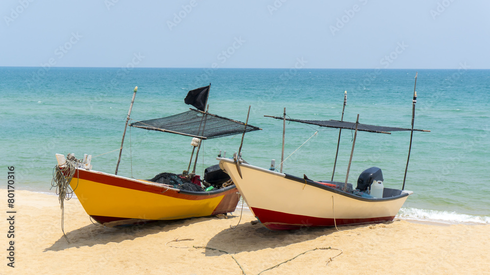 two boats at the beach