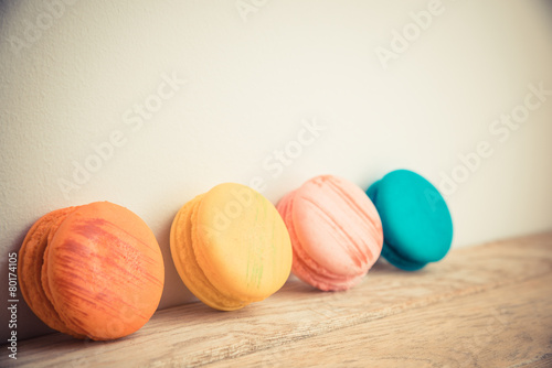Colorful macaron with white background on floor in Vintage style