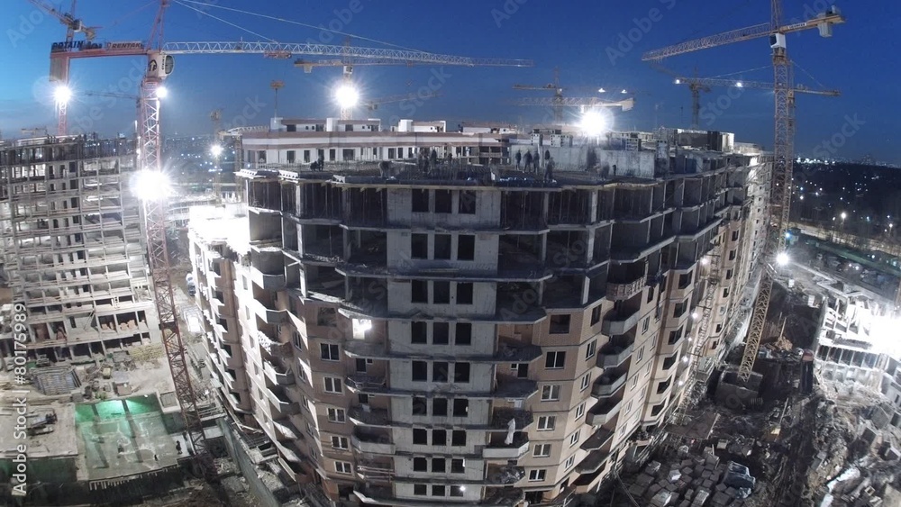 Constructors working at night on construction site. Timelapse Constructors working at night on construction site. Timelapse