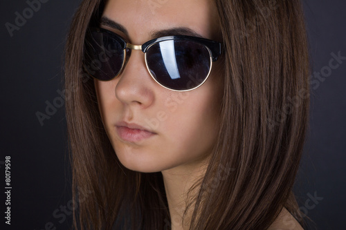 portrait of a girl in sunglasses © edinorog12