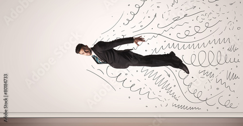 Business man flying with hand drawn lines comming out