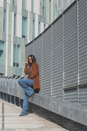 Beautiful girl posing in an urban context