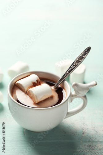 Hot chocolate with marshmallows in mug,