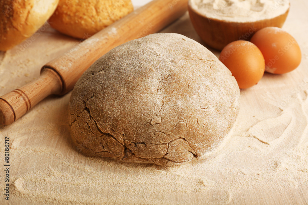 Making bread on wooden table background