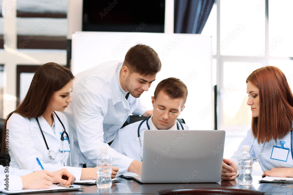Medical workers working in conference room Medical workers working in conference room
